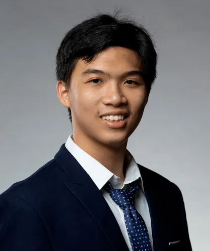 Bao Huynh in a suit, only head portion visible